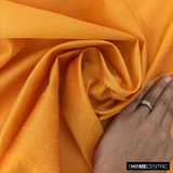 Saffron Orange Art Silk / Faux Silk Fabric By The Metre